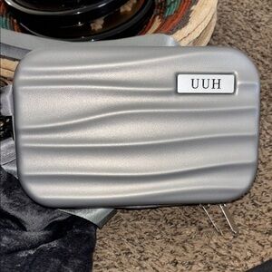 Gray Portable Audio Case with Wave Pattern
